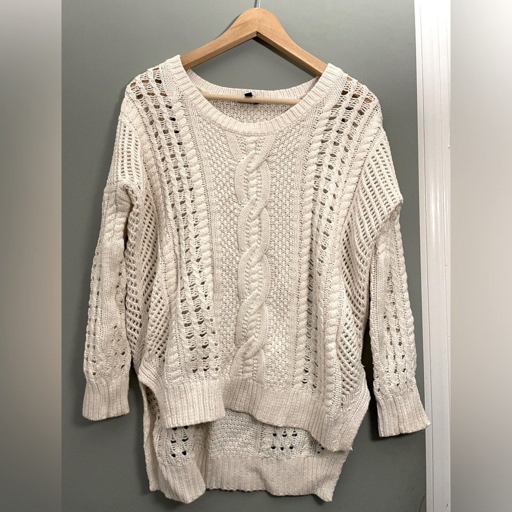 Express size small cream colored loose fit, cable knit sweater